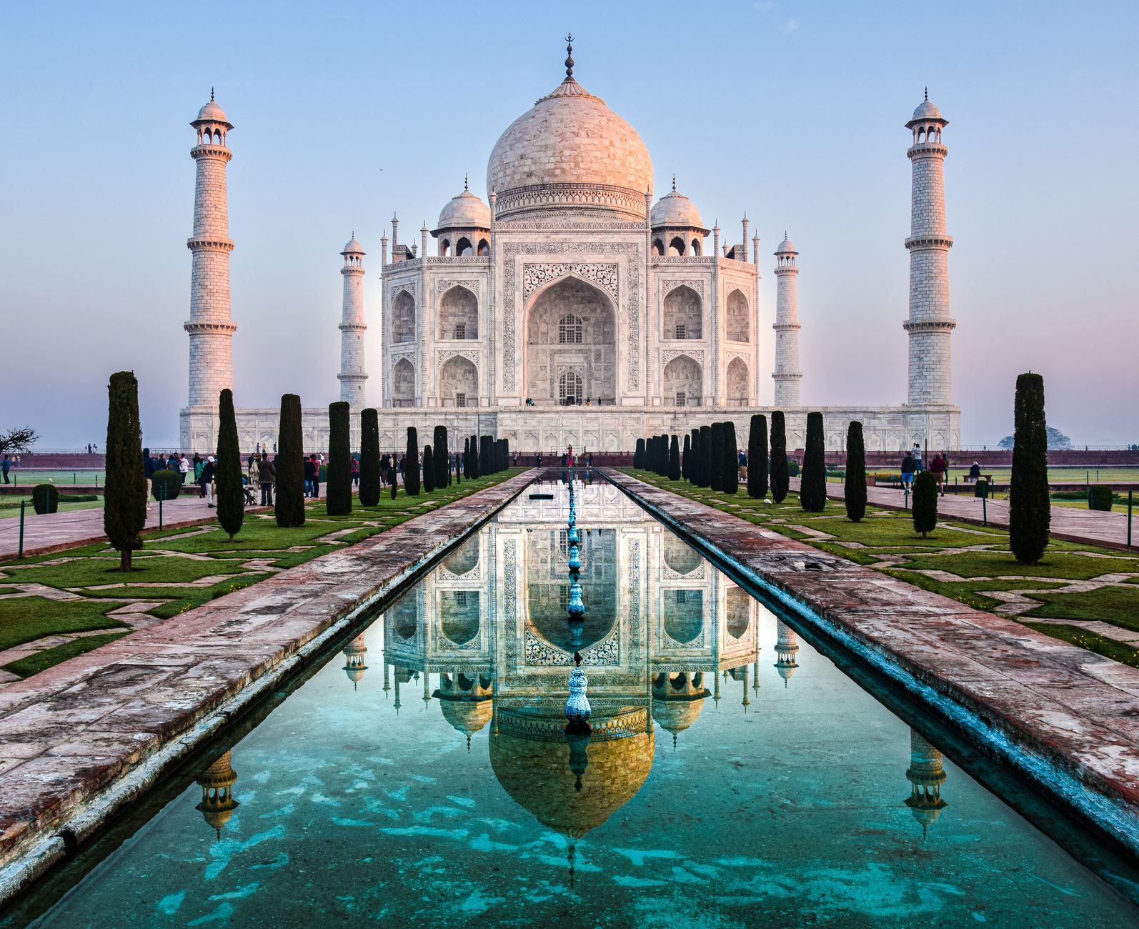 Taj Mahal white marble mausoleum in Agra seen from the main gate