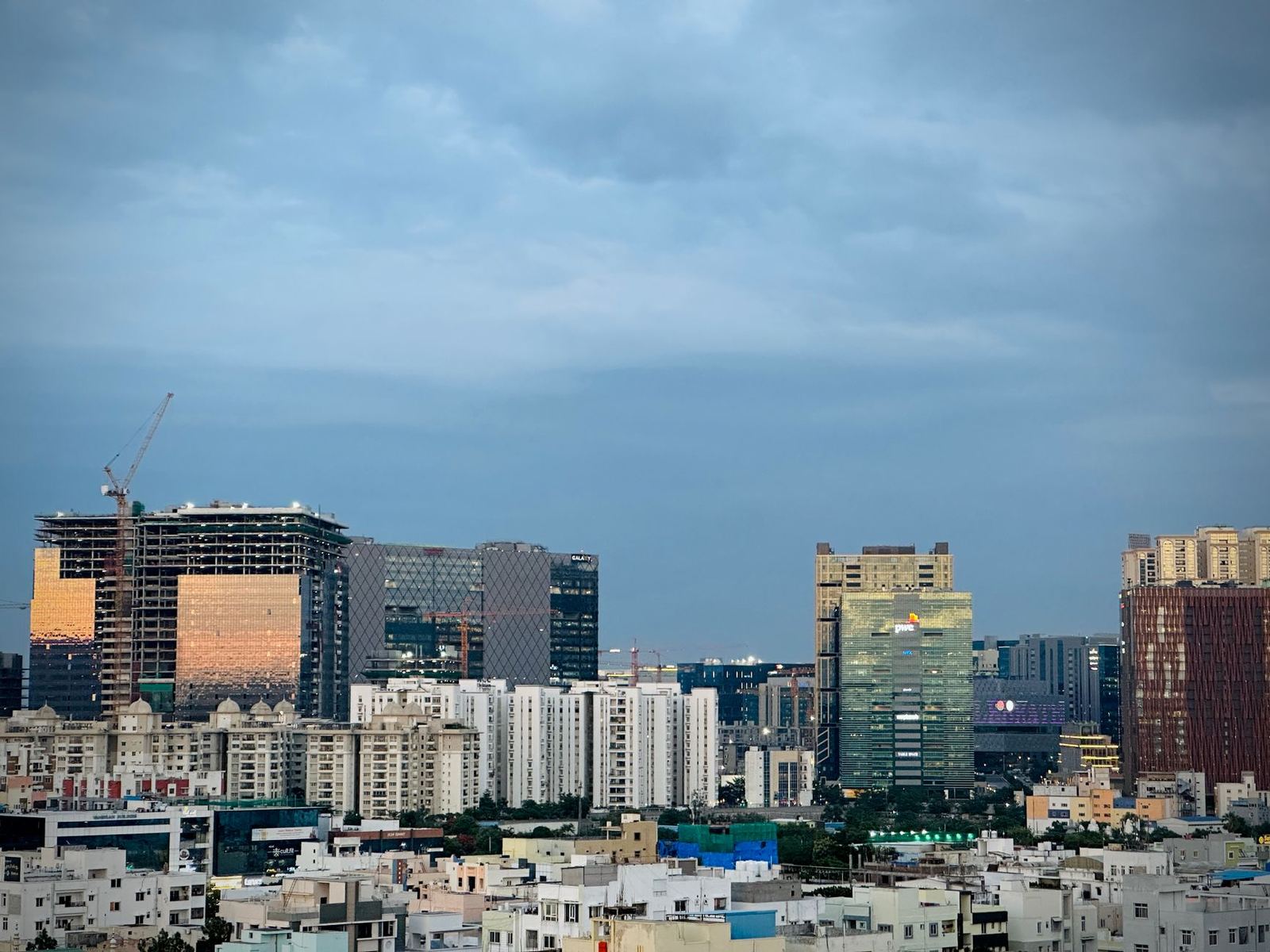 Glass office towers of Cyber City in Gurugram at night