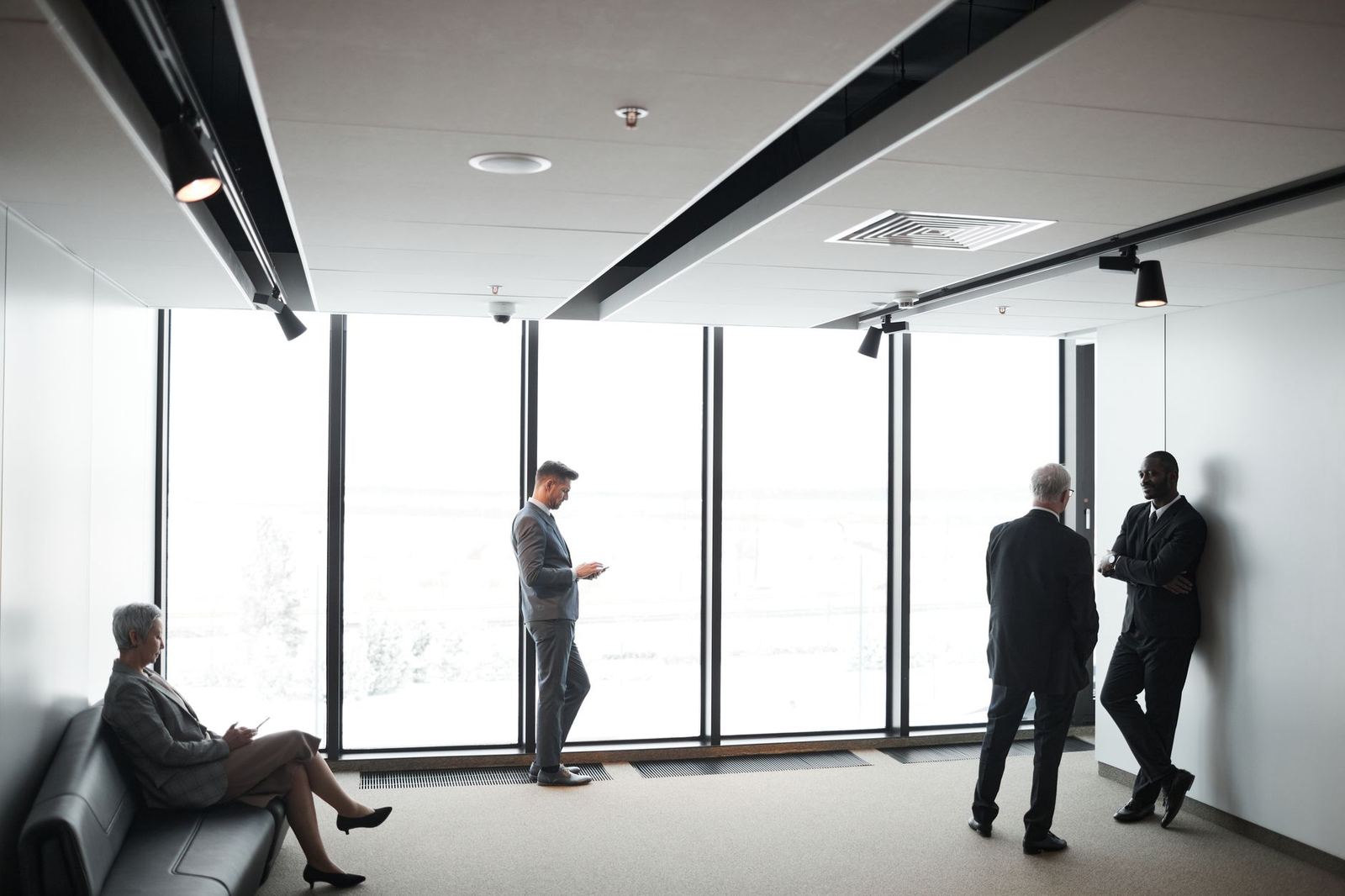 Colleagues in a glass office building